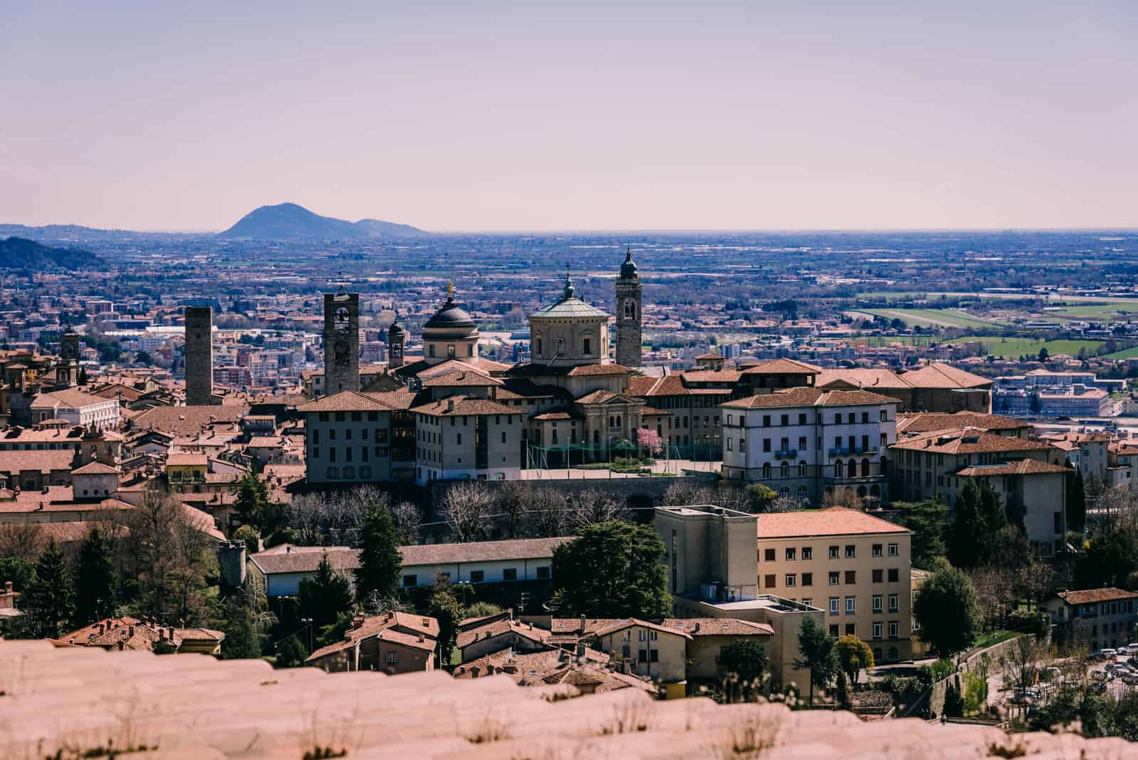 Walk through beautiful hills towards the old town of Bergamo