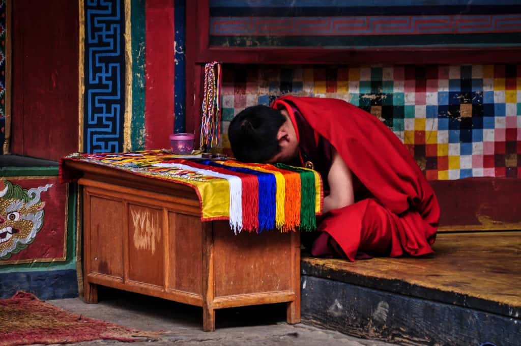 Bhutan young monk sleeping