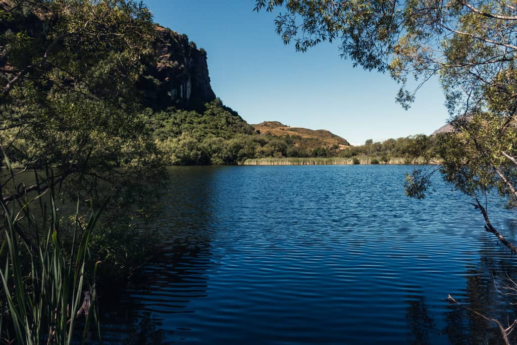 Diamond Lake appears dark bluw against bright summer sky