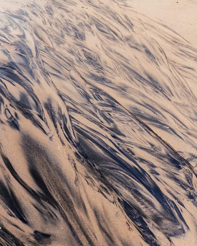 sand patterns on beach section of Humpridge Track