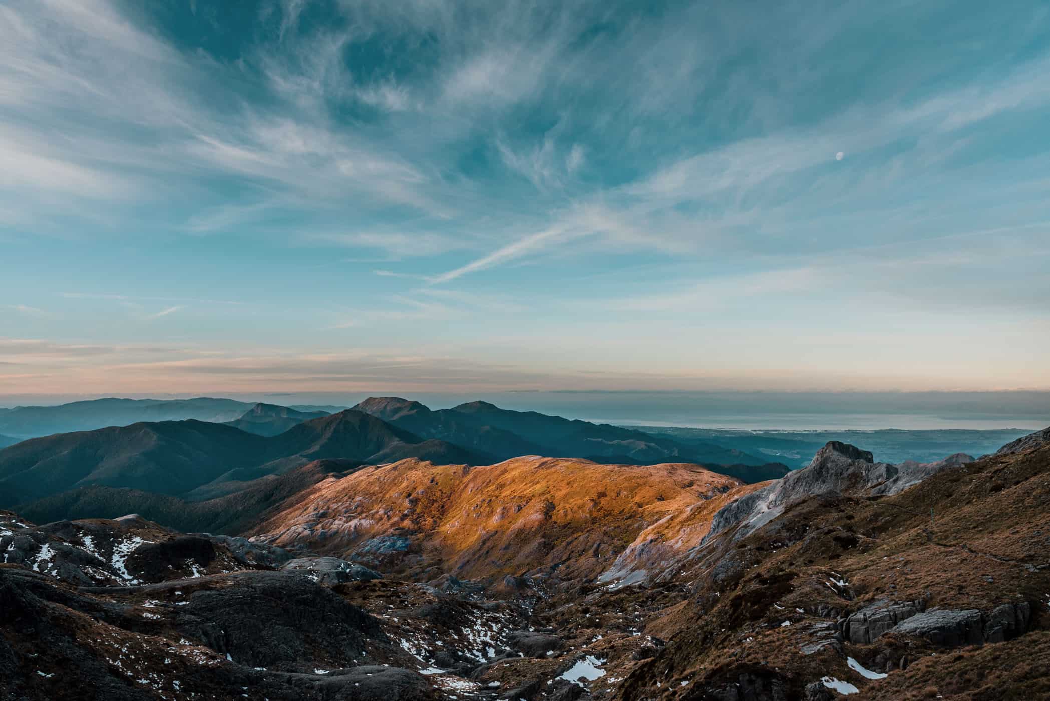 View from Mount Arthur summit track at sunset