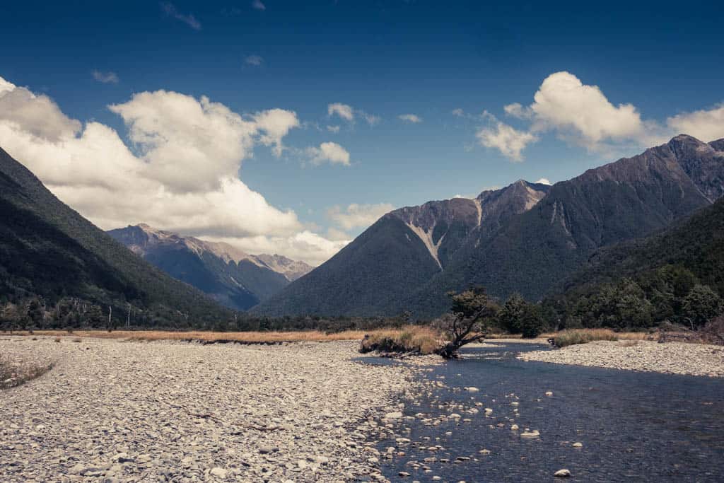 Coldwater Stream in front of mountain range of Travers valley