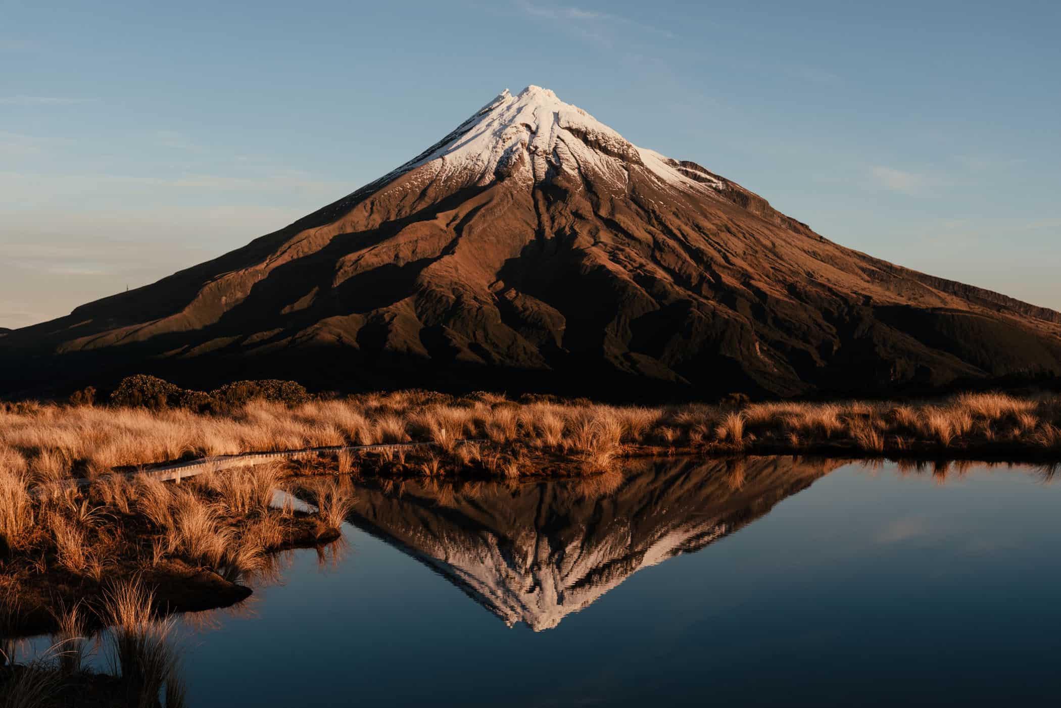 View of Mount Taranaki from Pouakai Tarns at sunset