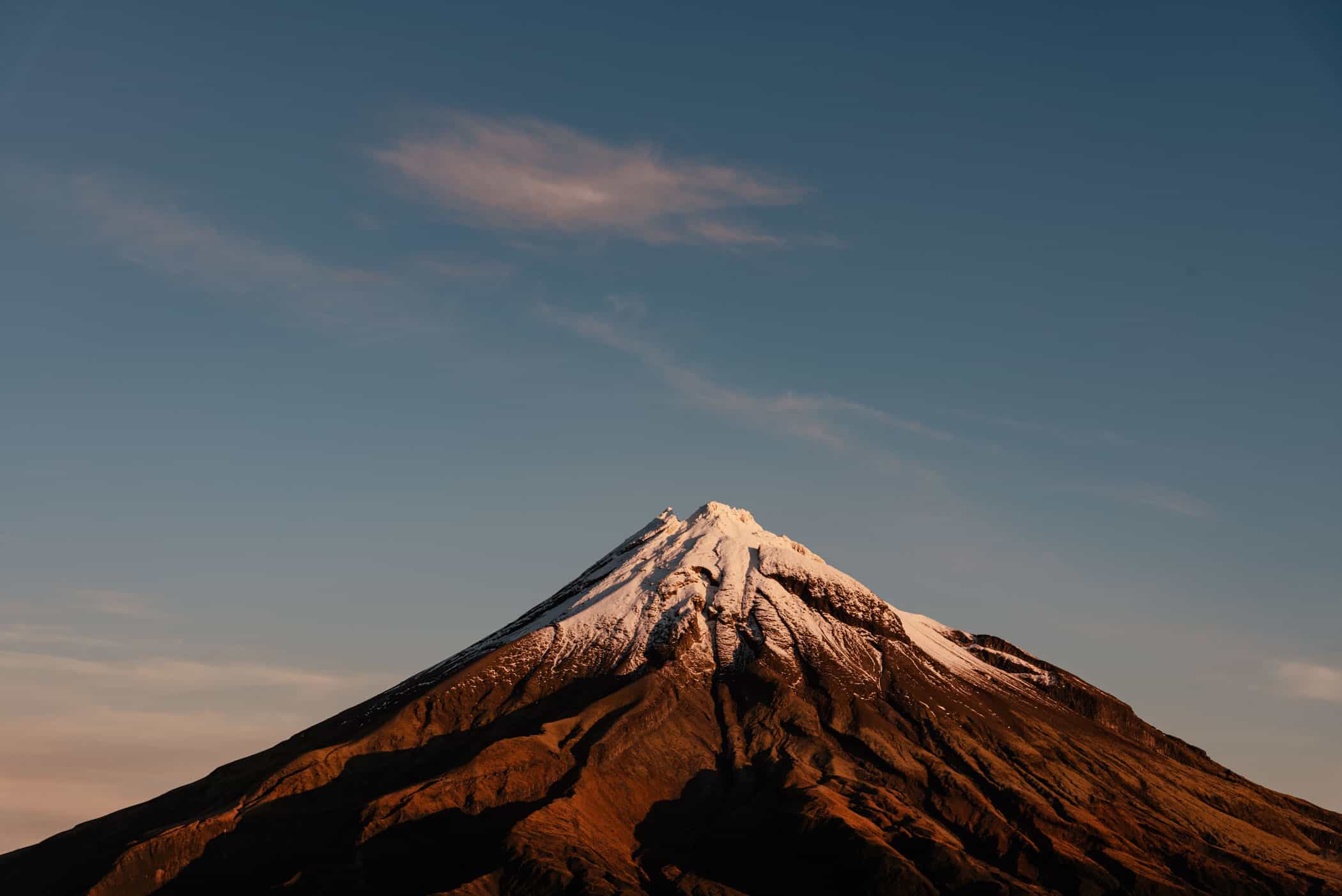 View of Mount Taranaki from Pouakai Tarns at sunset