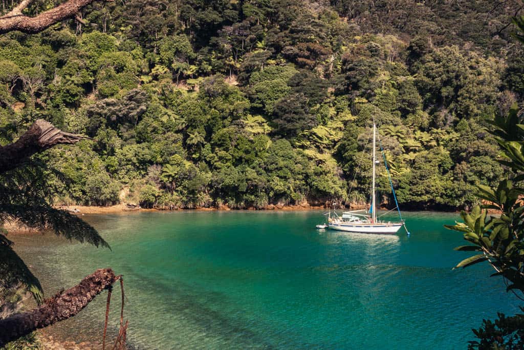 Ship in turquoise water at Marlborough Sounds