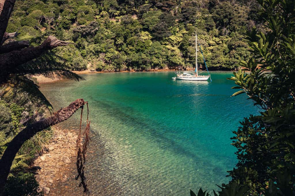 Ship in turquoise water at Marlborough Sounds
