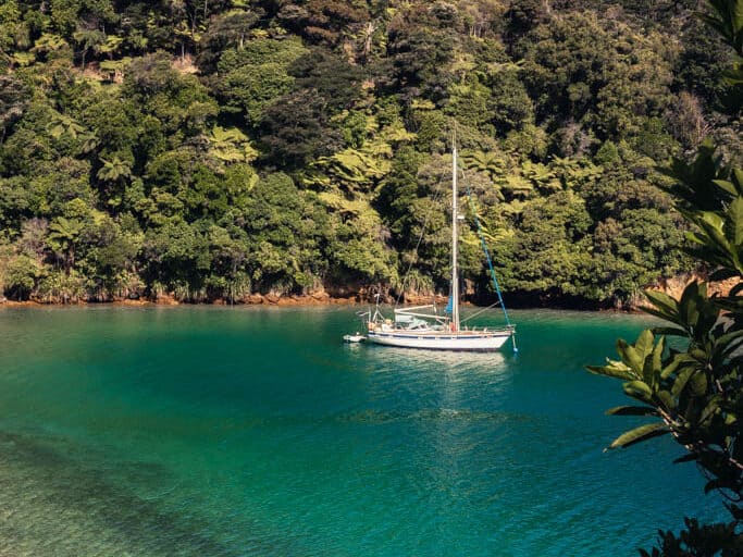 Ship in turquoise water at Marlborough Sounds